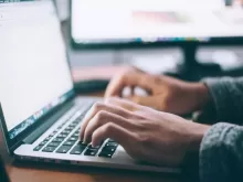 person using MacBook Pro