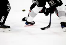 people playing ice hockey