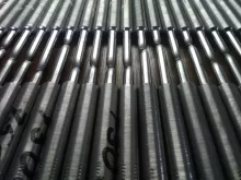 a close up of a row of black bars