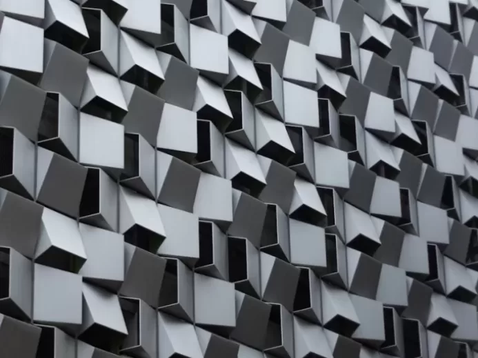 A close up of a wall made of cubes